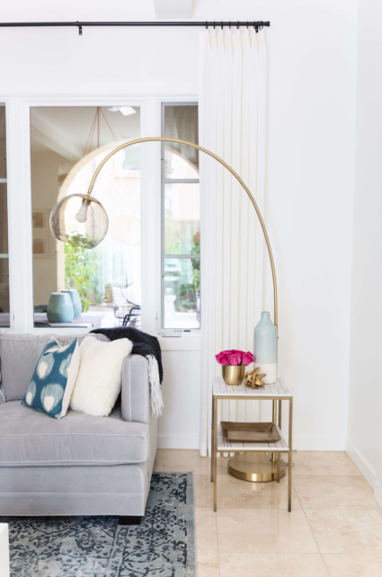 Contemporary modern arched floor lamp with clear bulb shade
