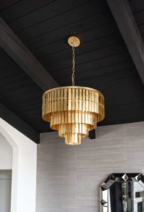 gold chandelier on black ceiling interior design scottsdale